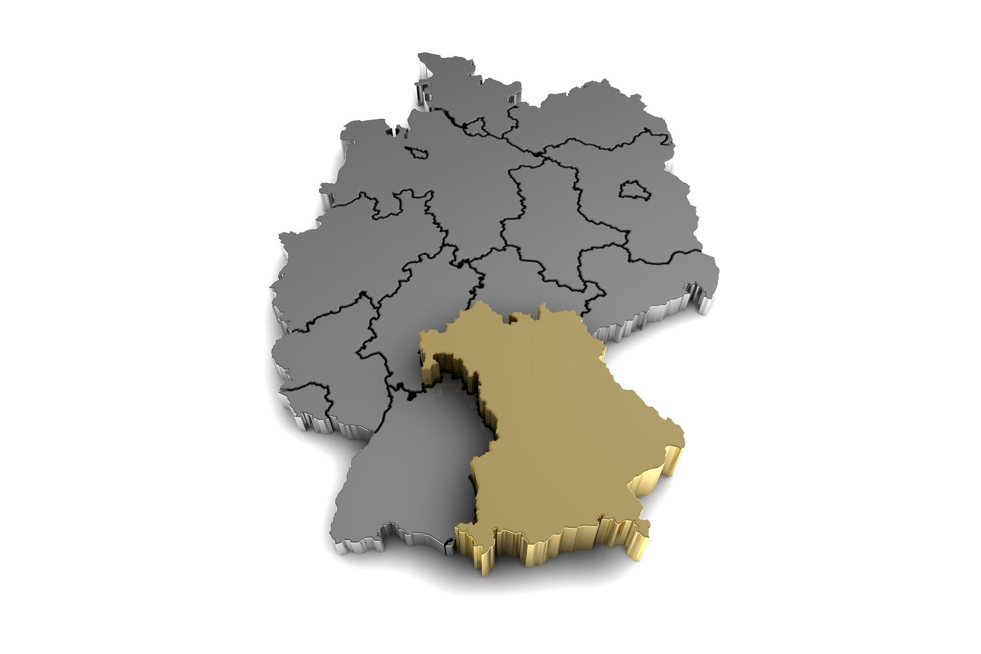 Metal germany map, with bayern region, highlighted in gold.3d render